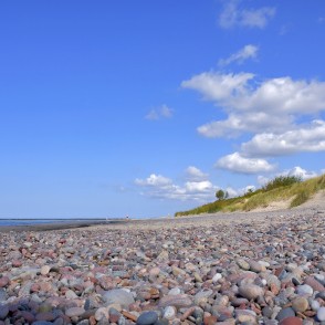 Nida Pebble beach with sand dunes along the Baltic Sea Nida Pebble beach with sand dunes along the Baltic Sea