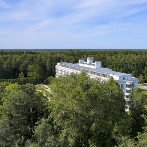 Aerial view of Ķemeri Hotel surrounded by forest Aerial view of Ķemeri Hotel surrounded by forest