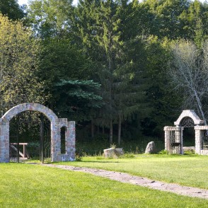 Stone arches and gates in Vaclovas Intas stone park Stone arches and gates in Vaclovas Intas stone park