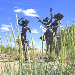 Fisherman Daughters sculpture through dune grass Sventoji Fisherman Daughters sculpture through dune grass Sventoji
