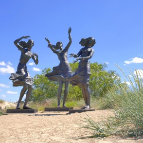 Fisherman Daughters sculpture in coastal sand Sventoji Fisherman Daughters sculpture in coastal sand Sventoji